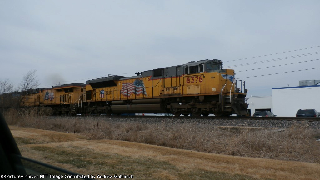 UP 8376 & 7679 about to pass Apple Auto shop